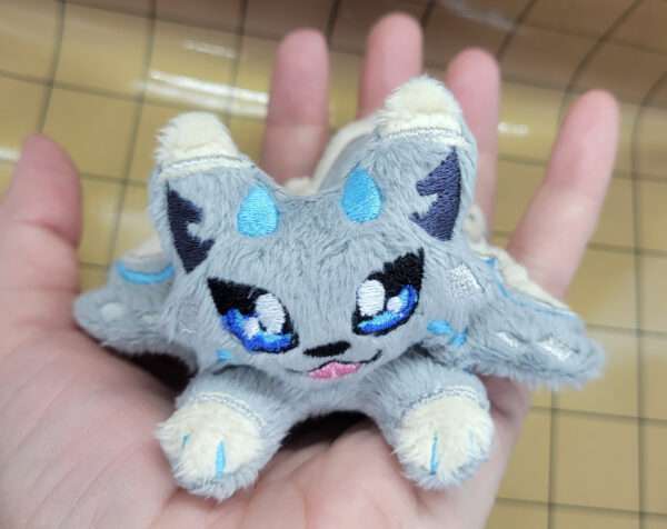 Wolf Dragon Pocket Plush Sitting in Palm